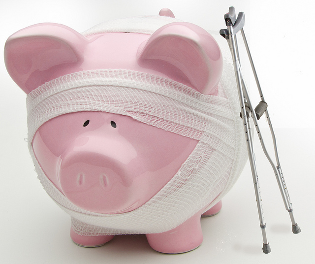 Kenteegardin Injured Piggy Bank WIth Crutches